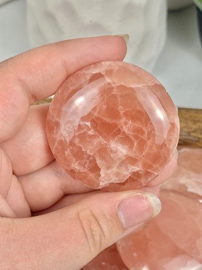 1 strawberry calcite “cookie” flat stone