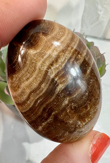 1 chocolate calcite cabochon