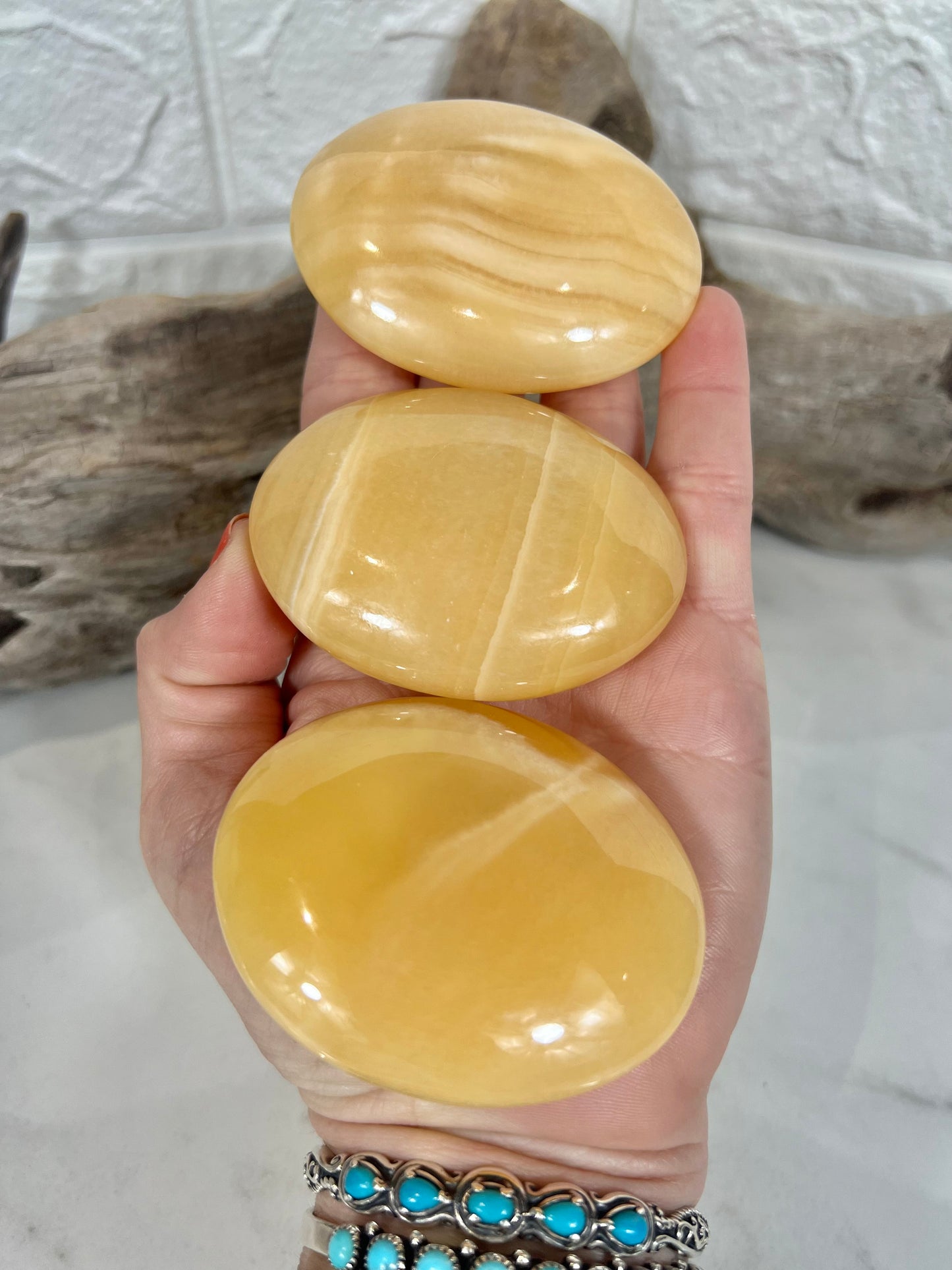 1 Orange calcite palm stone