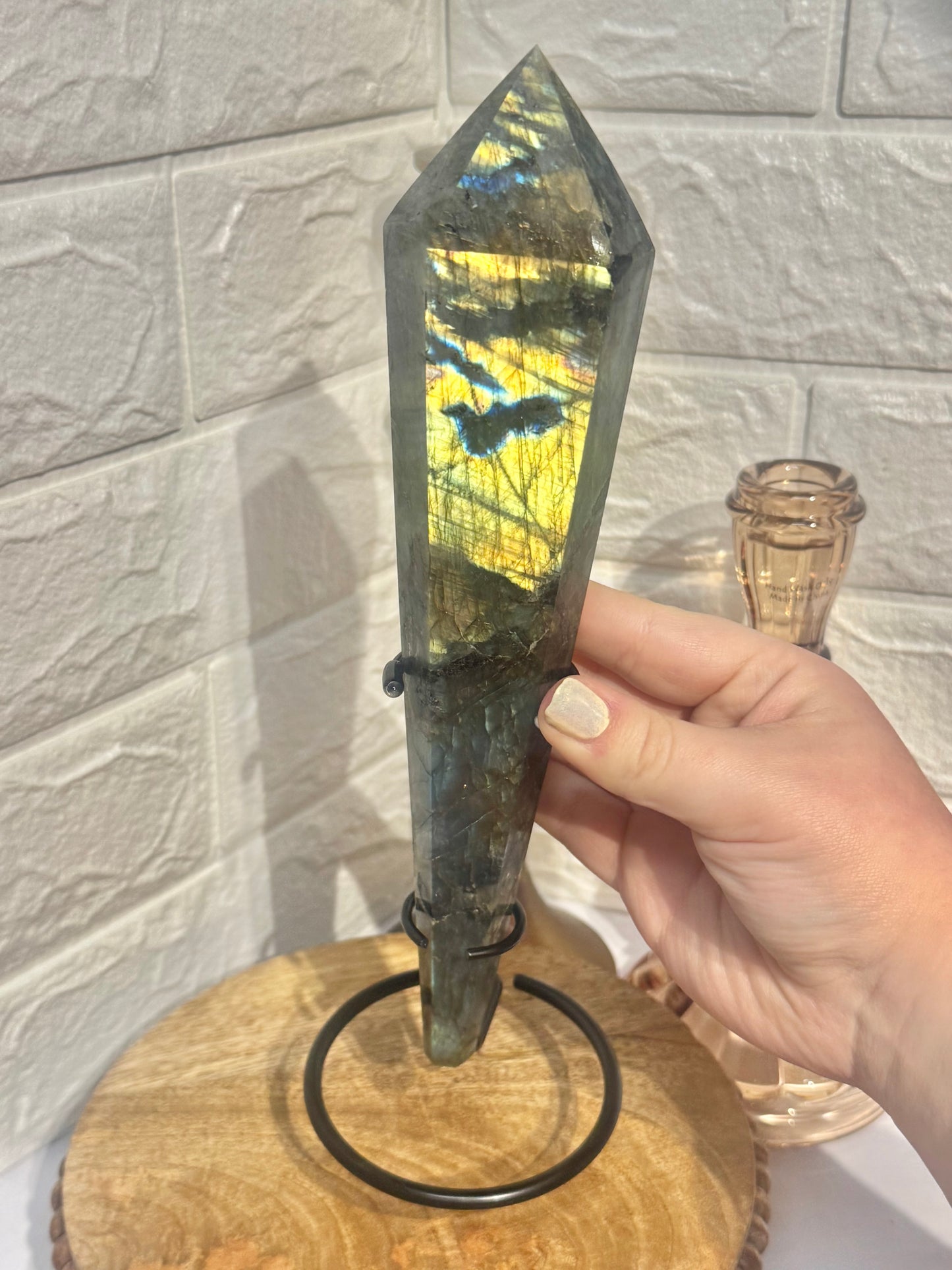 Flashy labradorite wand on custom black stand