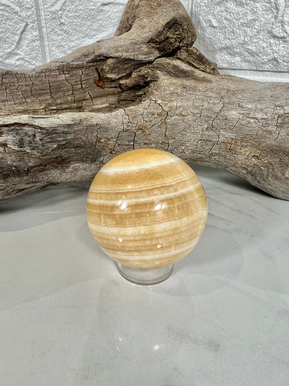 Stunning orange calcite sphere A