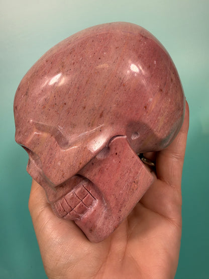 Amazing deep pink rhodonite skull