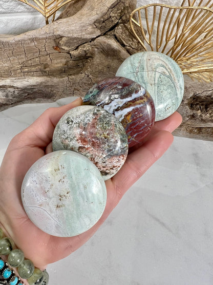 1 colorful unicorn jasper round palm stone