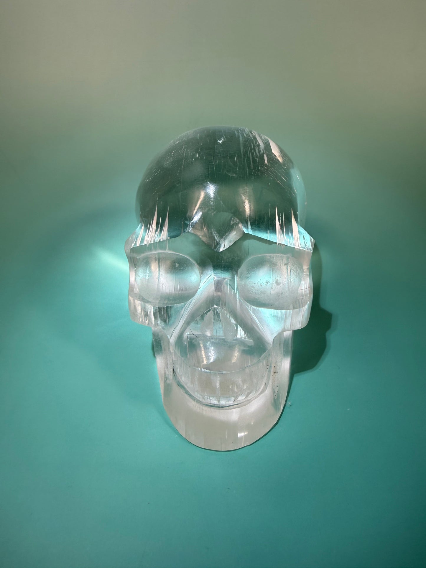 Amazing satin spar skull carving X