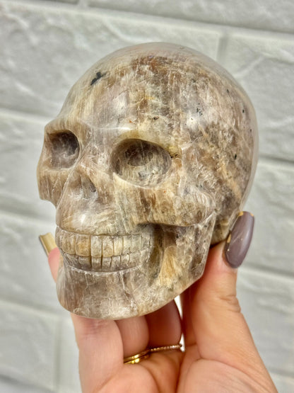 Flashy belomorite skull (moonstone x sunstone)