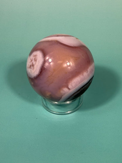Stunning pink jelly agate sphere U (heated color)