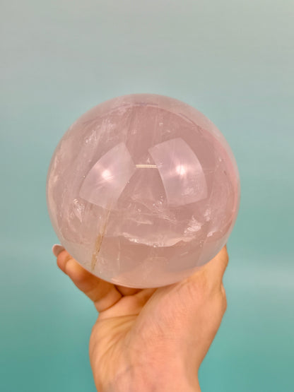 Statement flashy star rose quartz sphere