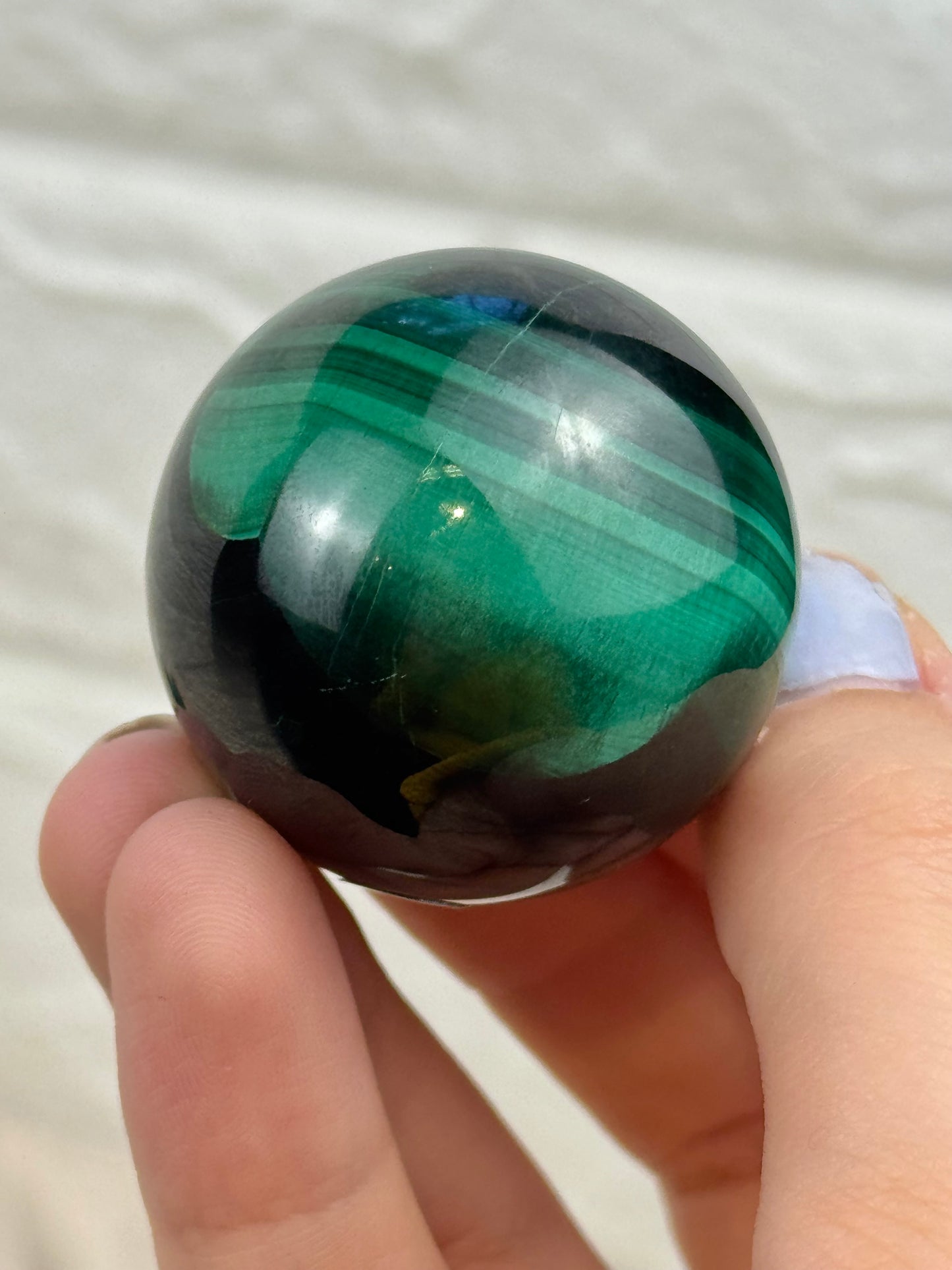 You pick! Chatoyant malachite spheres
