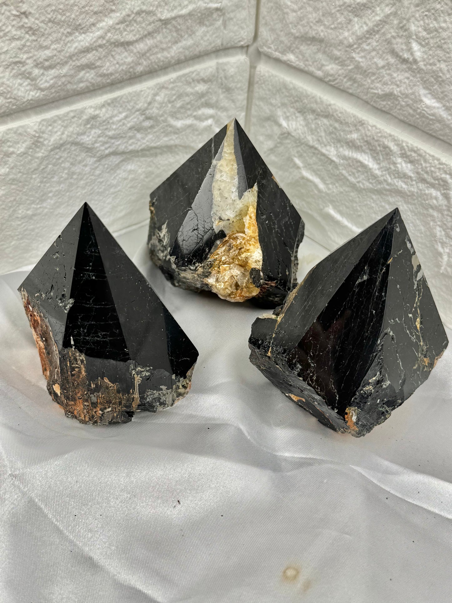 1 black tourmaline, mica, and quartz top polished point from Brazil