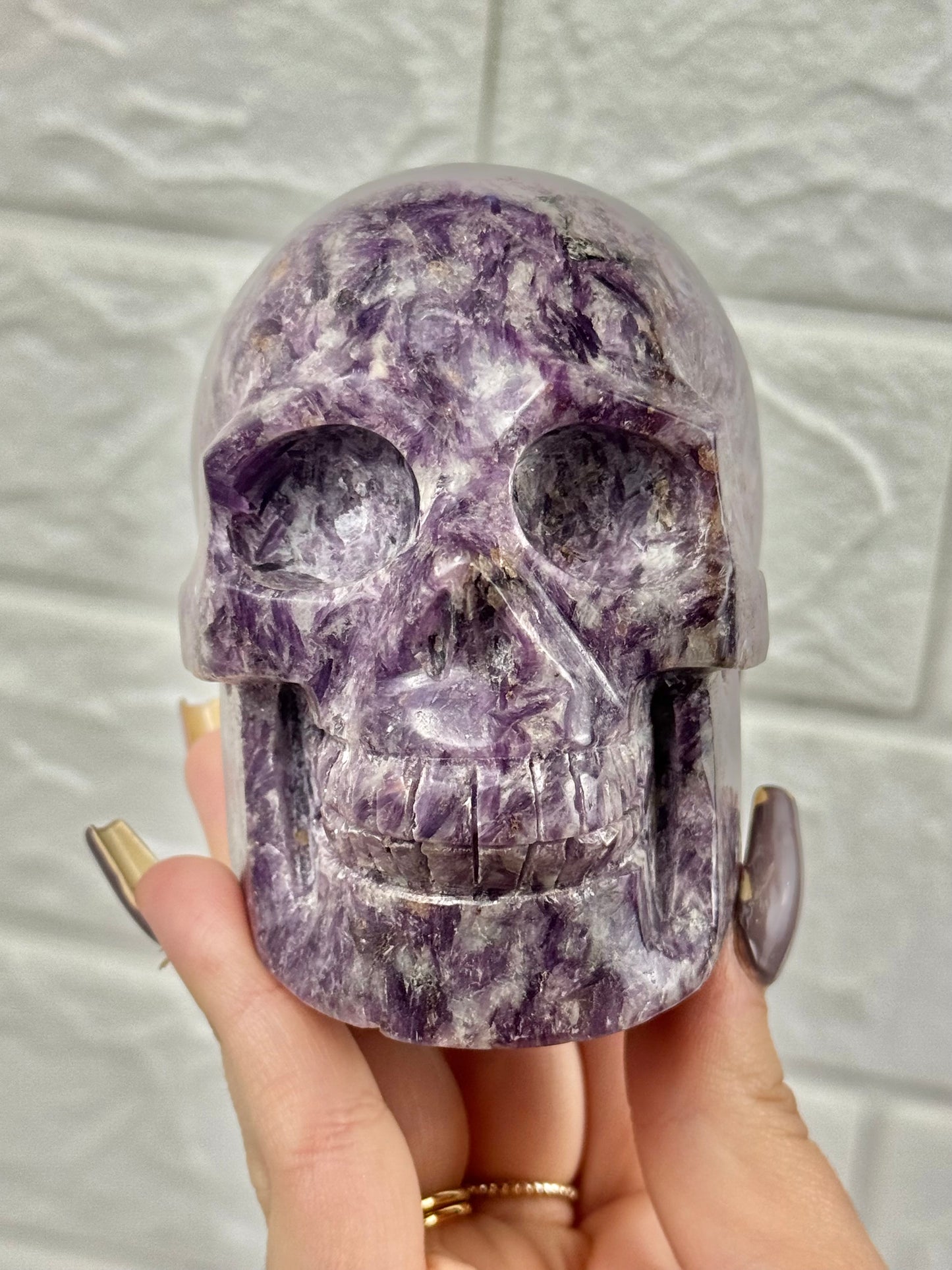 Flashy lepidolite skull