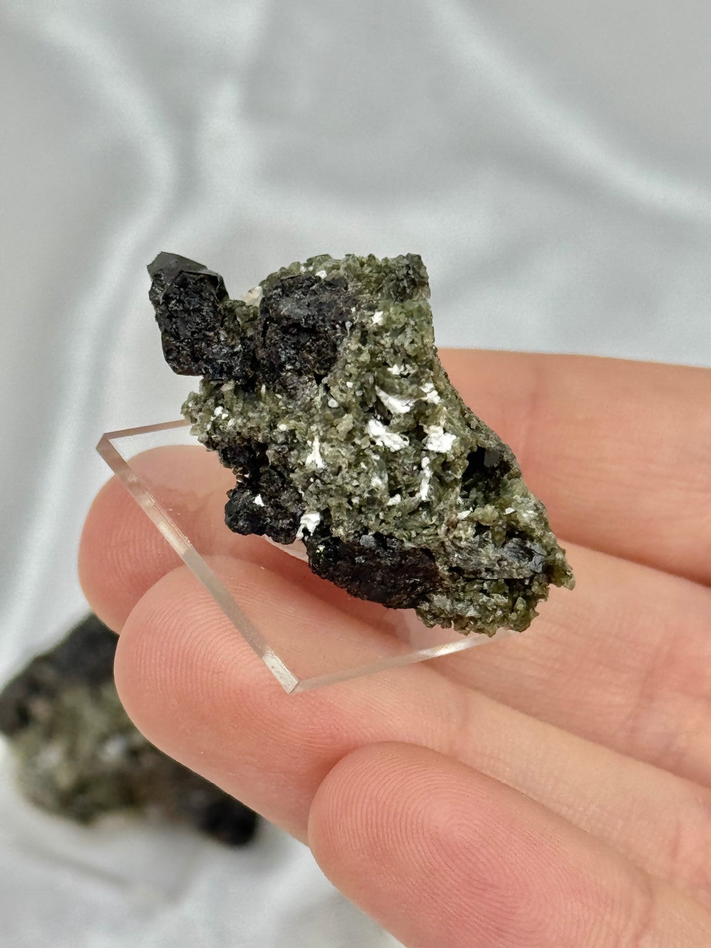 1 black garnet on stand from Mexico