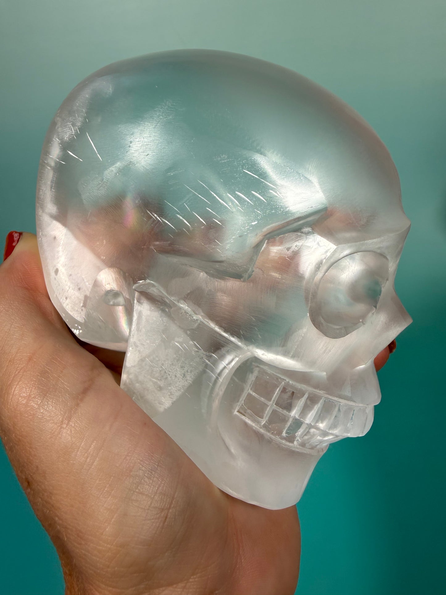 Incredible satin spar skull carving C