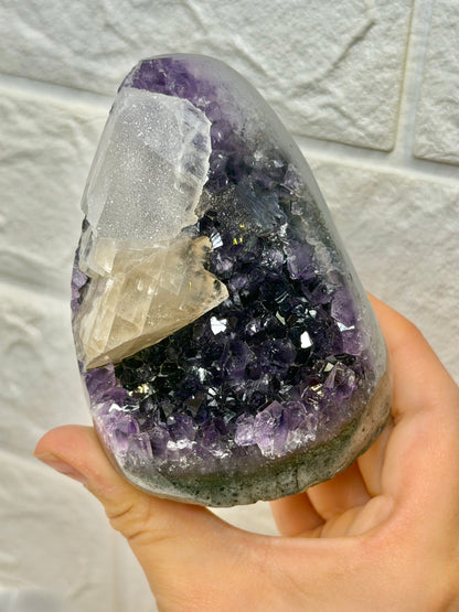 Beautiful deep purple Uruguay amethyst with calcite and goethite W