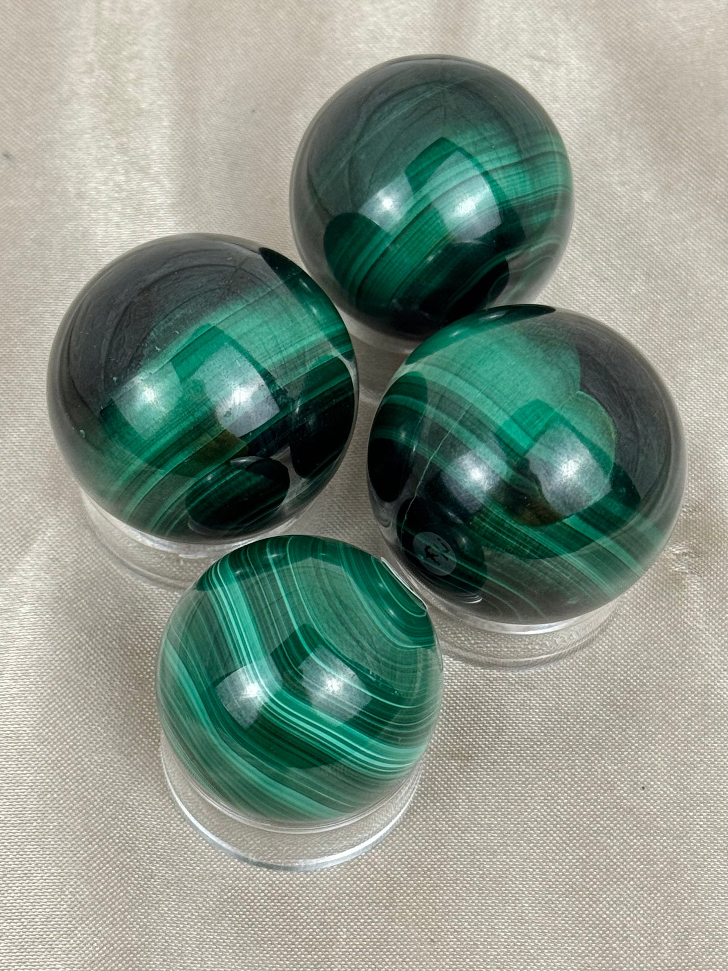 You pick! Chatoyant malachite spheres
