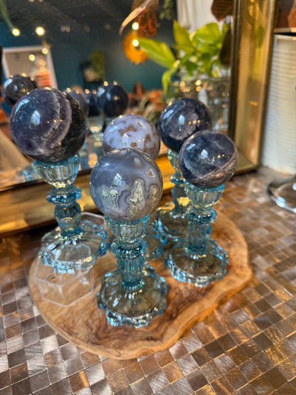 1 light blue glass sphere/candle holder (sphere not included)