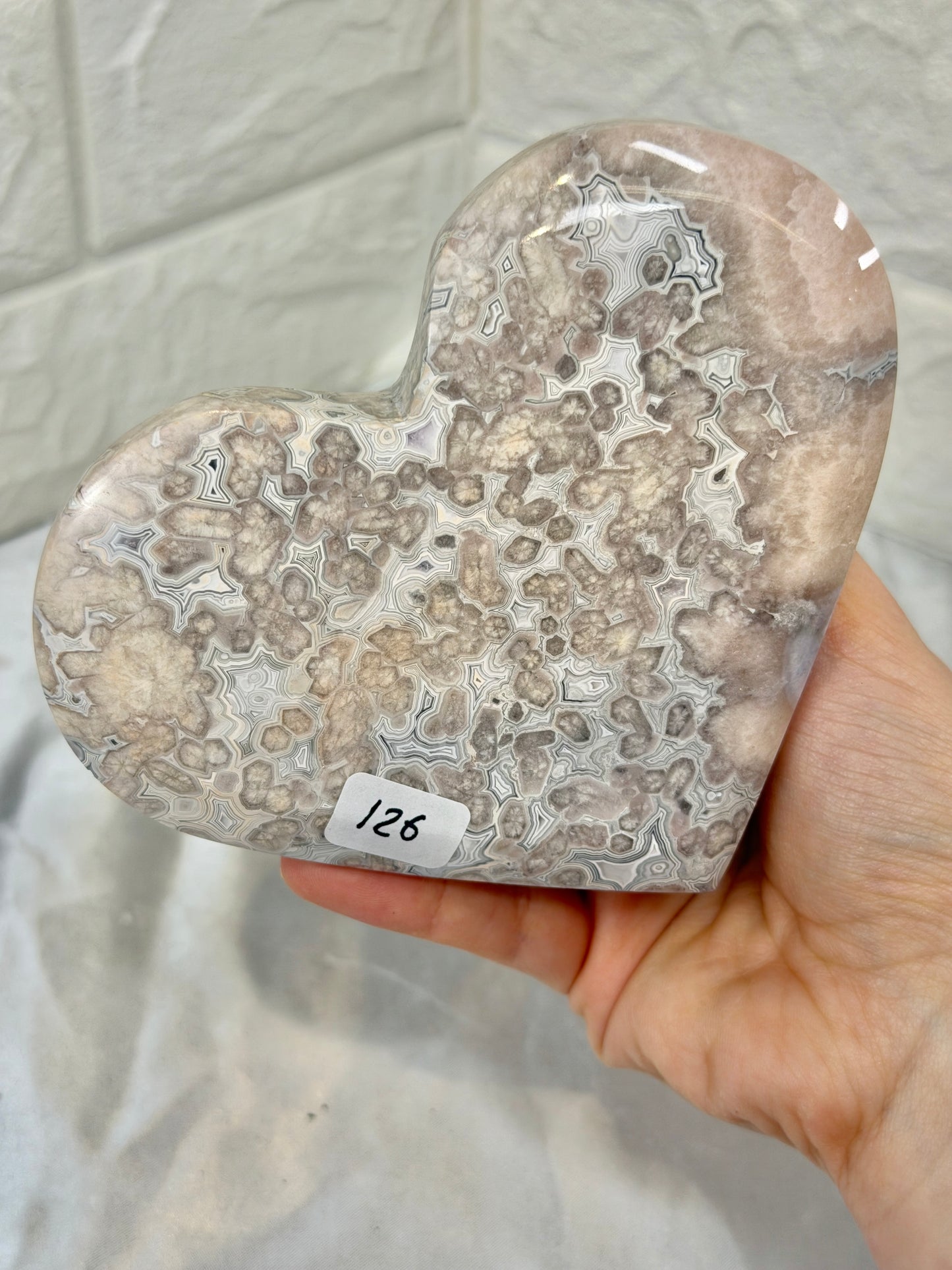 Incredible banded pink amethyst heart on stand