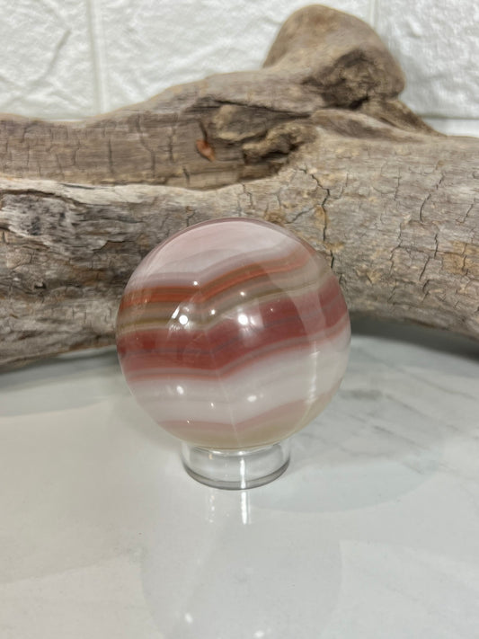 Beautiful pink banded calcite sphere A