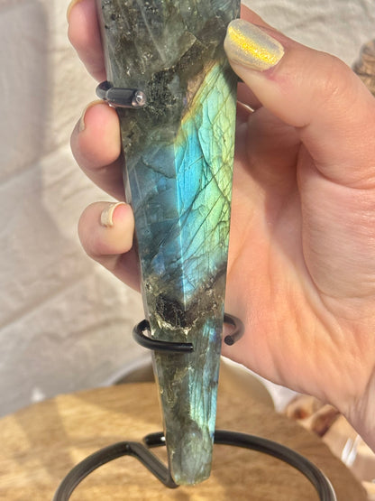 Flashy labradorite wand on custom black stand