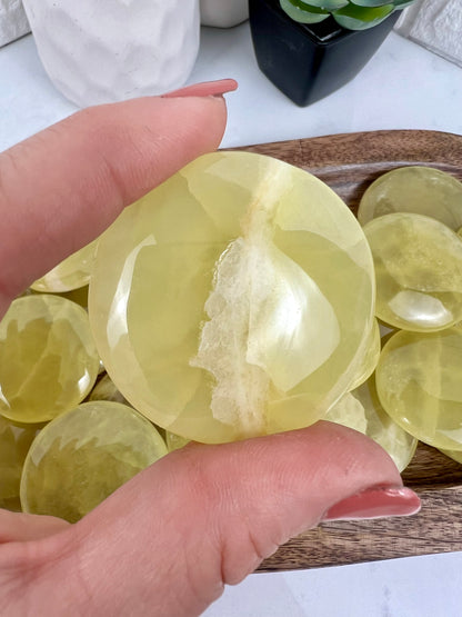 1 lemon calcite “cookie” flat stone