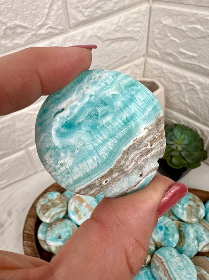 1 blue aragonite “cookie” flat stone