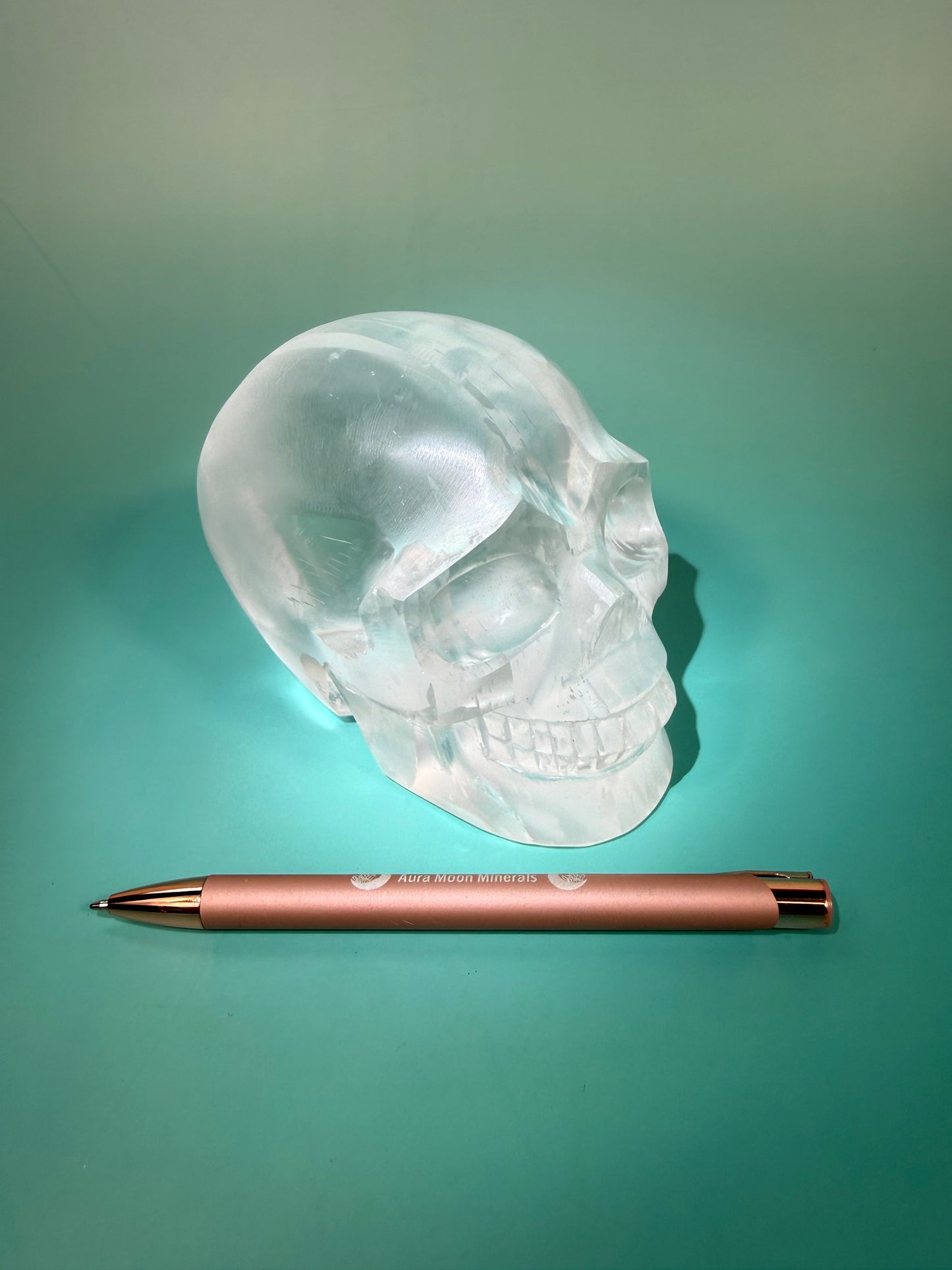 Incredible satin spar skull carving C