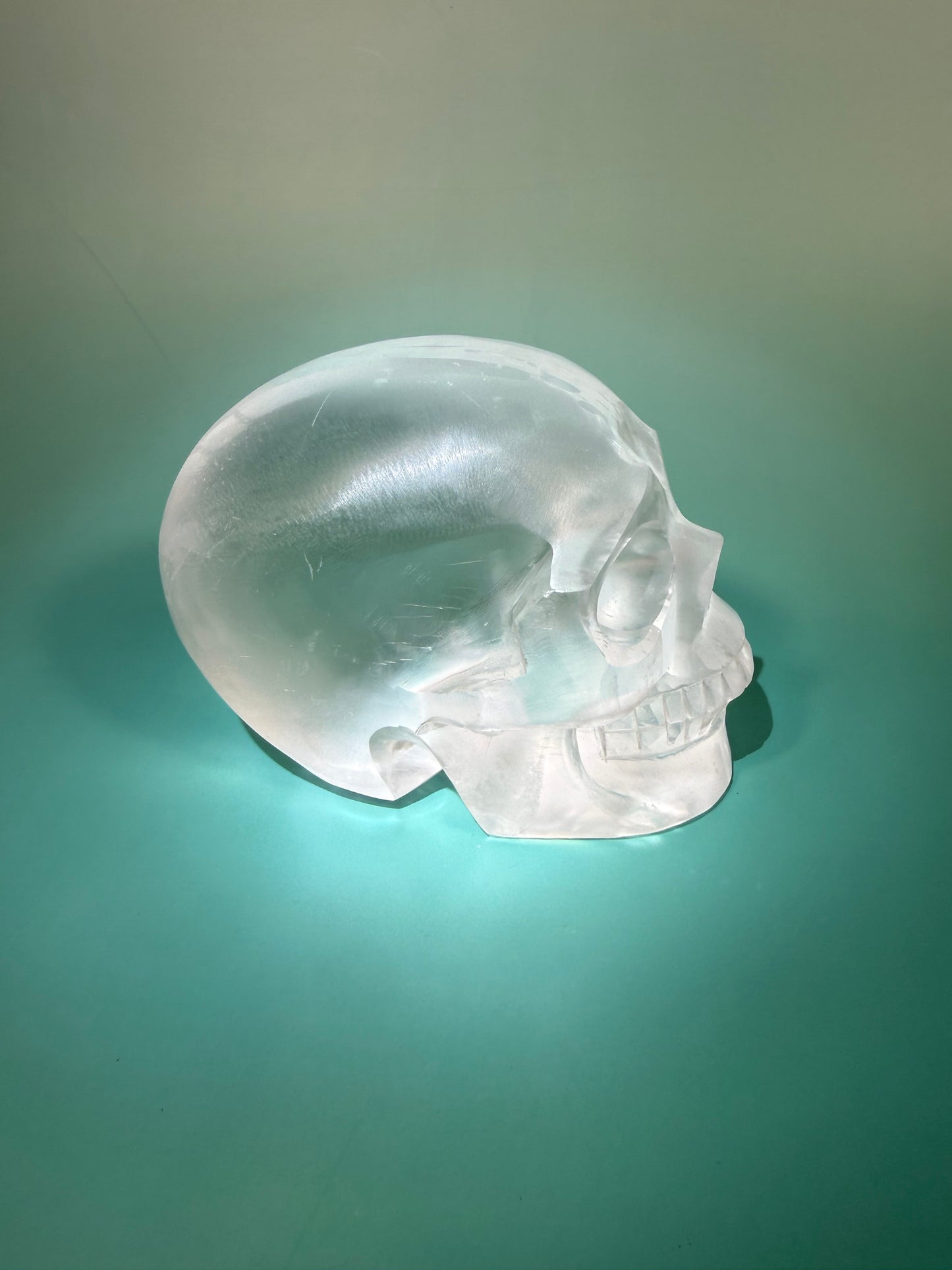 Incredible satin spar skull carving C