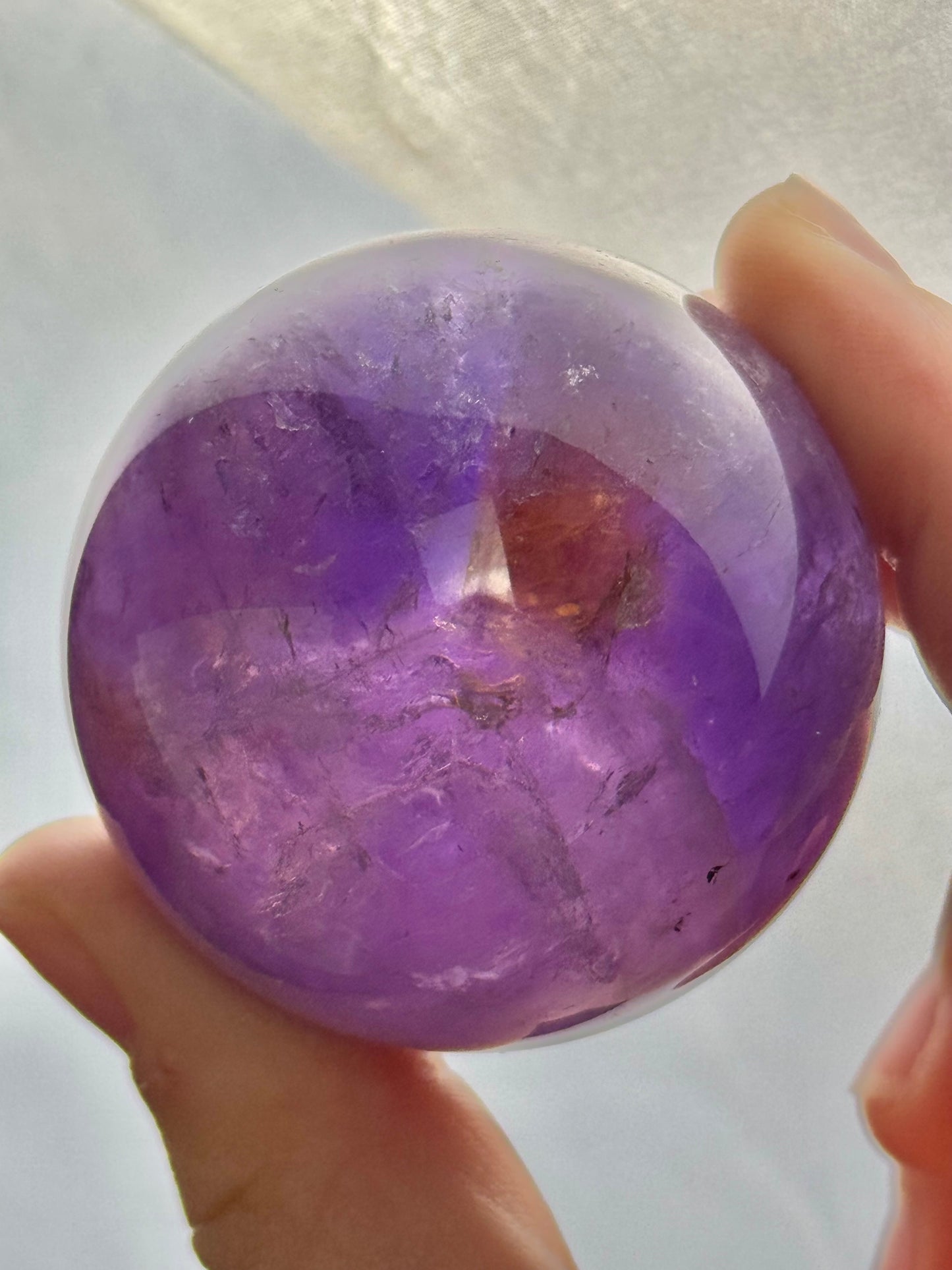 Beautiful ametrine sphere (amethyst with citrine)