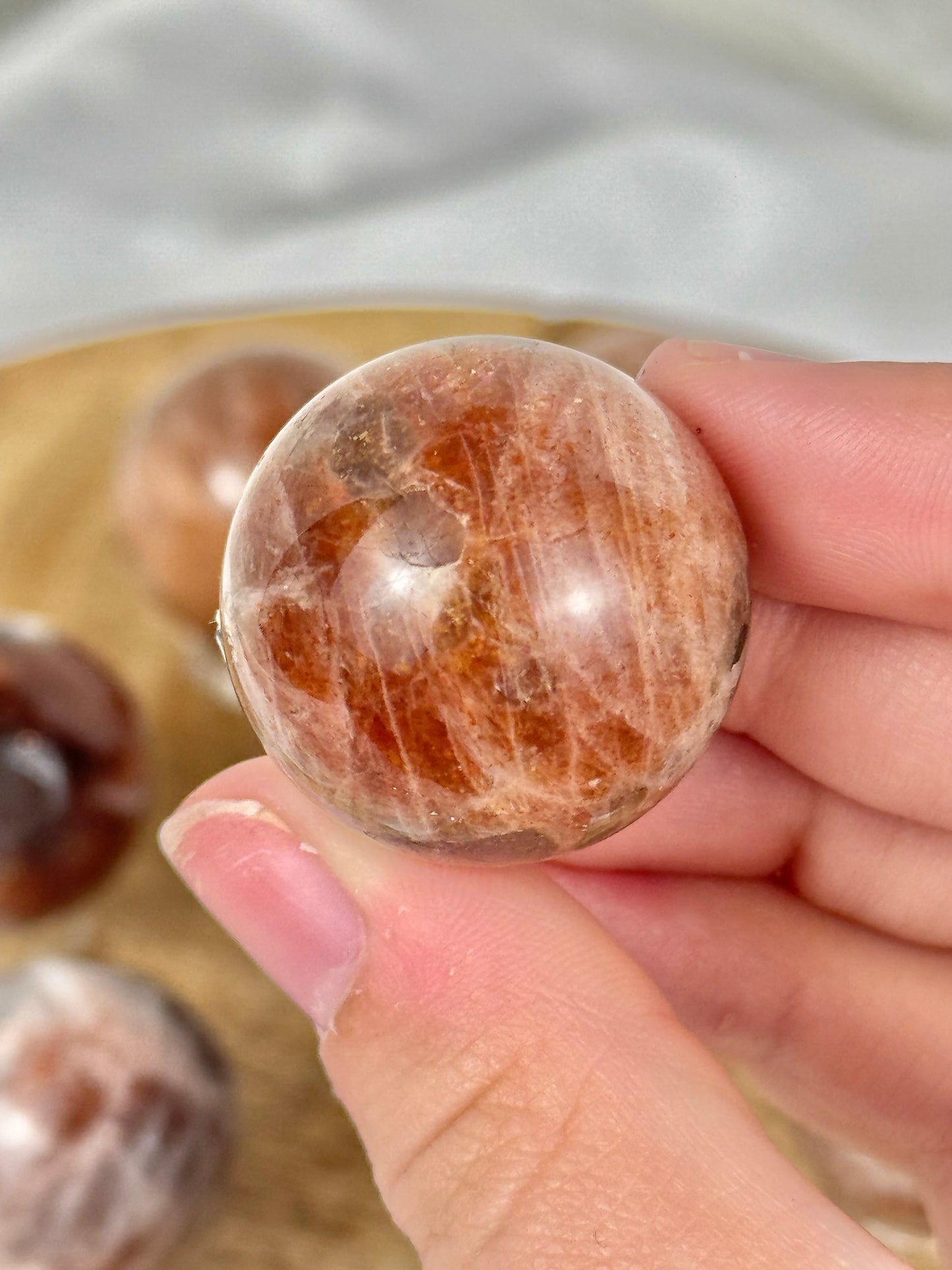 1 flashy sunstone x moonstone sphere from Tanzania