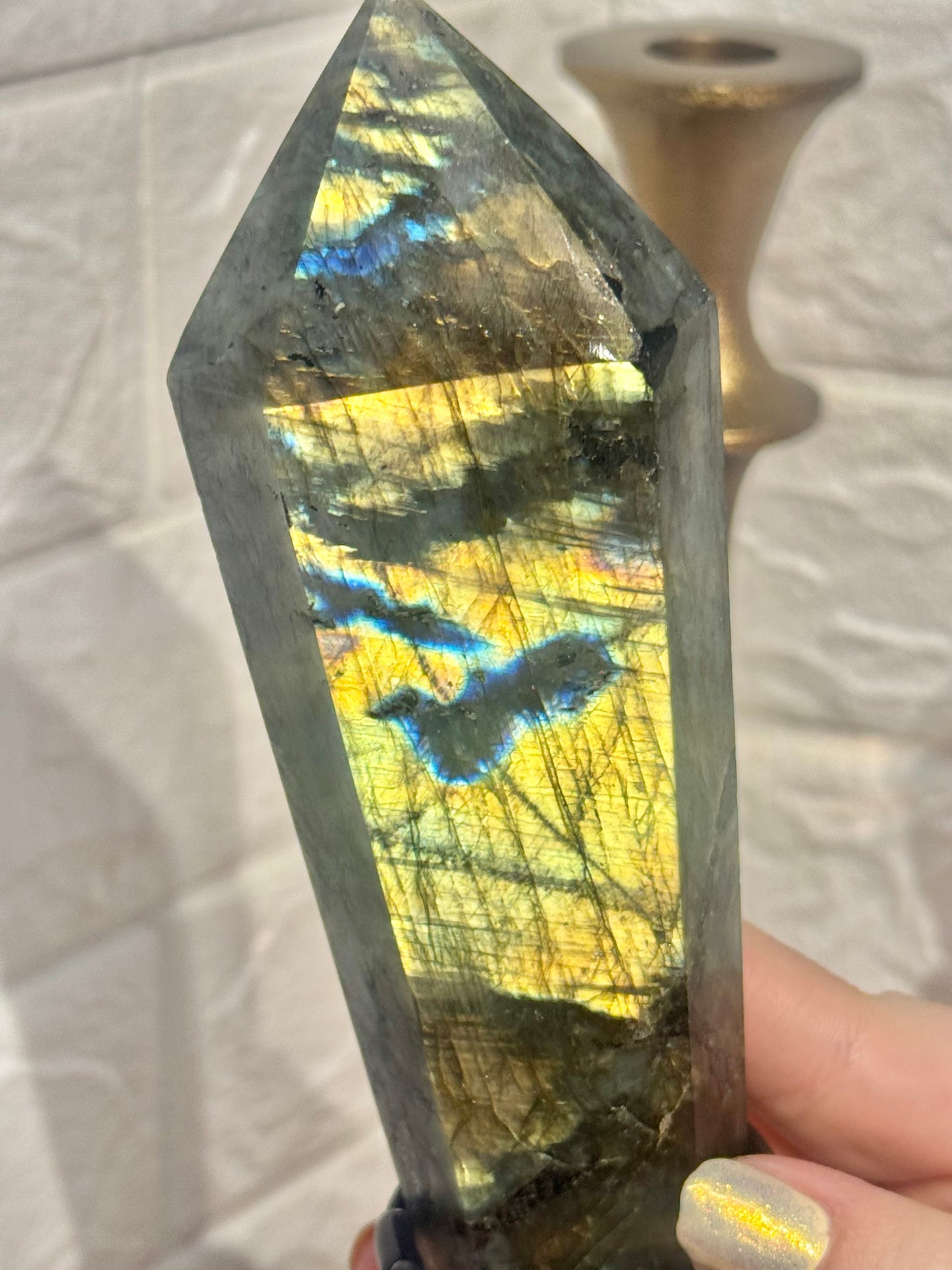 Flashy labradorite wand on custom black stand