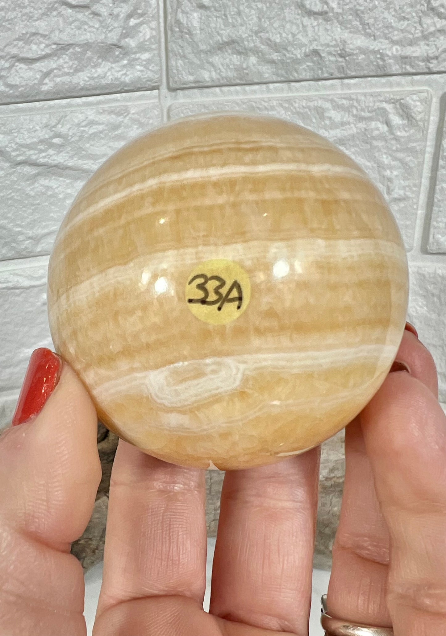 Stunning orange calcite sphere A