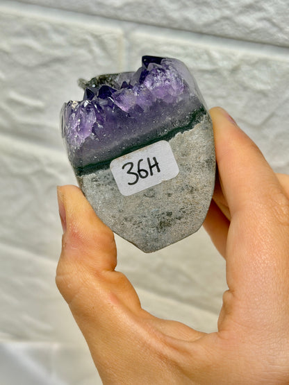 Juicy purple Uruguay amethyst with calcite and goethite H