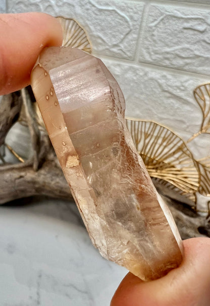 1 MED pink lemurian quartz point from Brazil