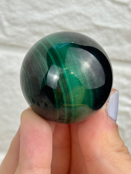 You pick! Chatoyant malachite spheres