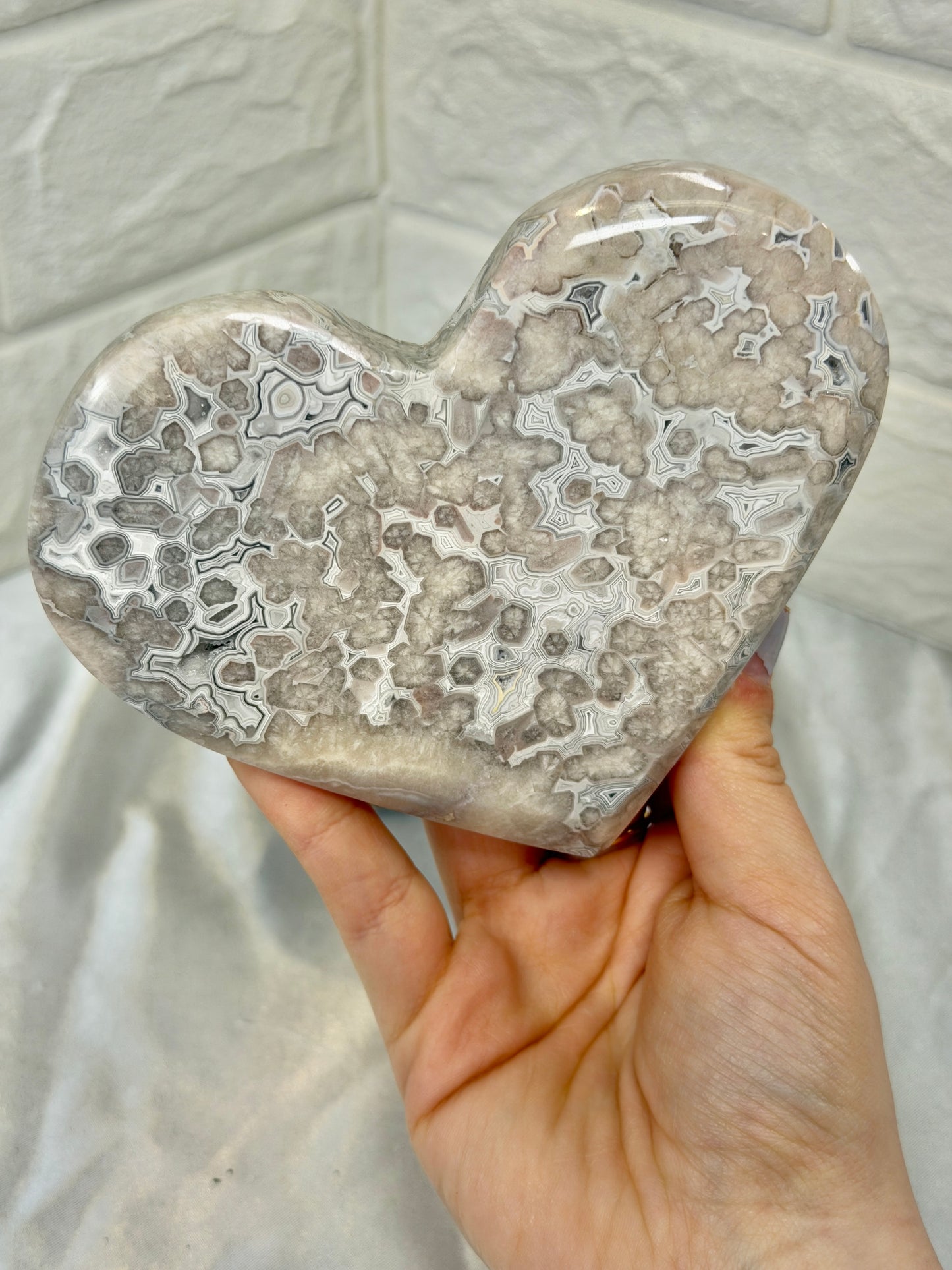 Incredible banded pink amethyst heart on stand