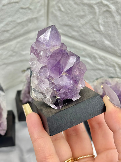 1 raw amethyst on stand from Brazil