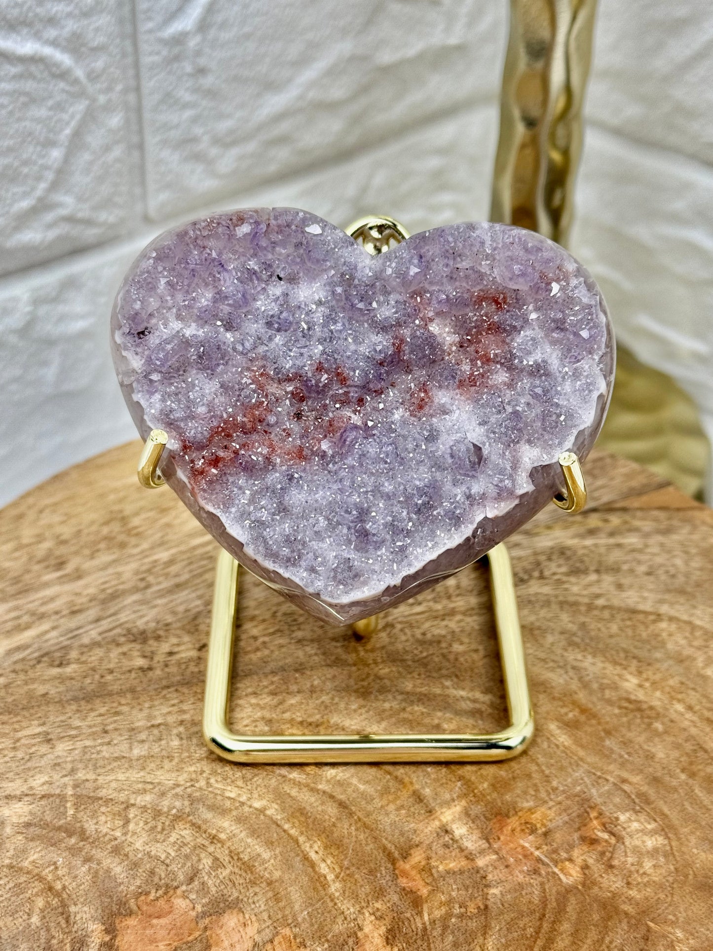 Beautiful lavender amethyst heart with hematite on gold stand from Brazil