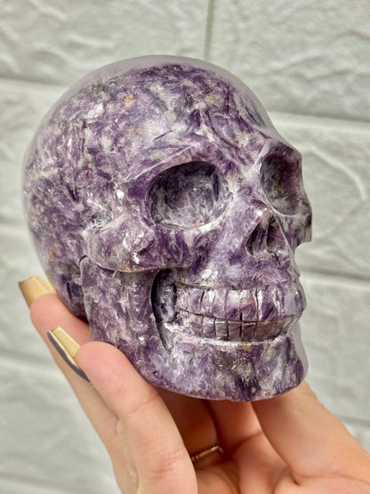 Flashy lepidolite skull