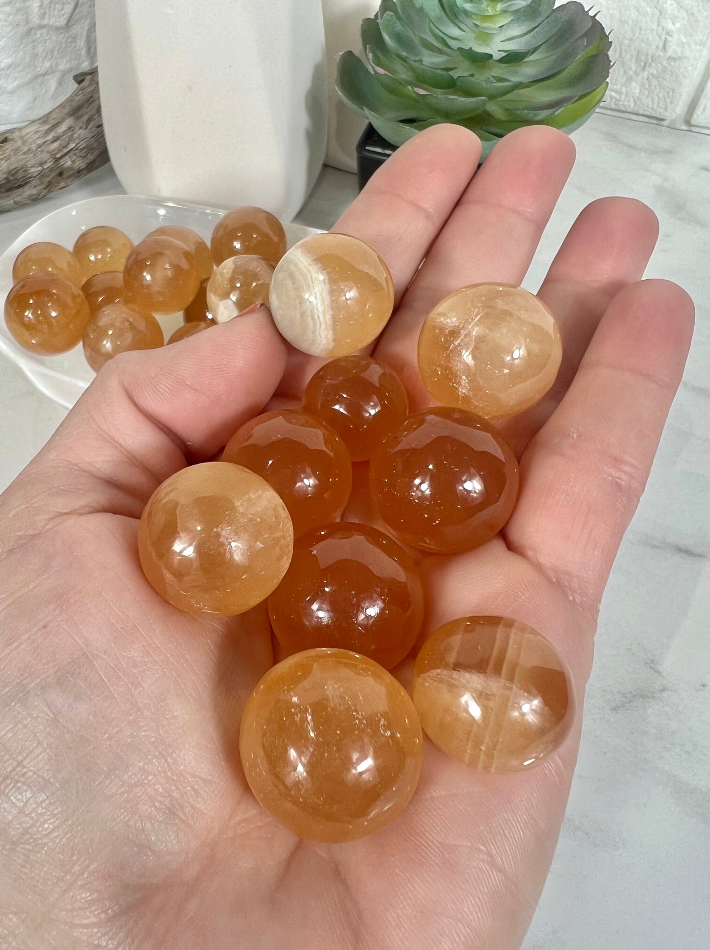 1 juicy honey calcite mini sphere