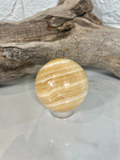 Stunning orange calcite sphere A