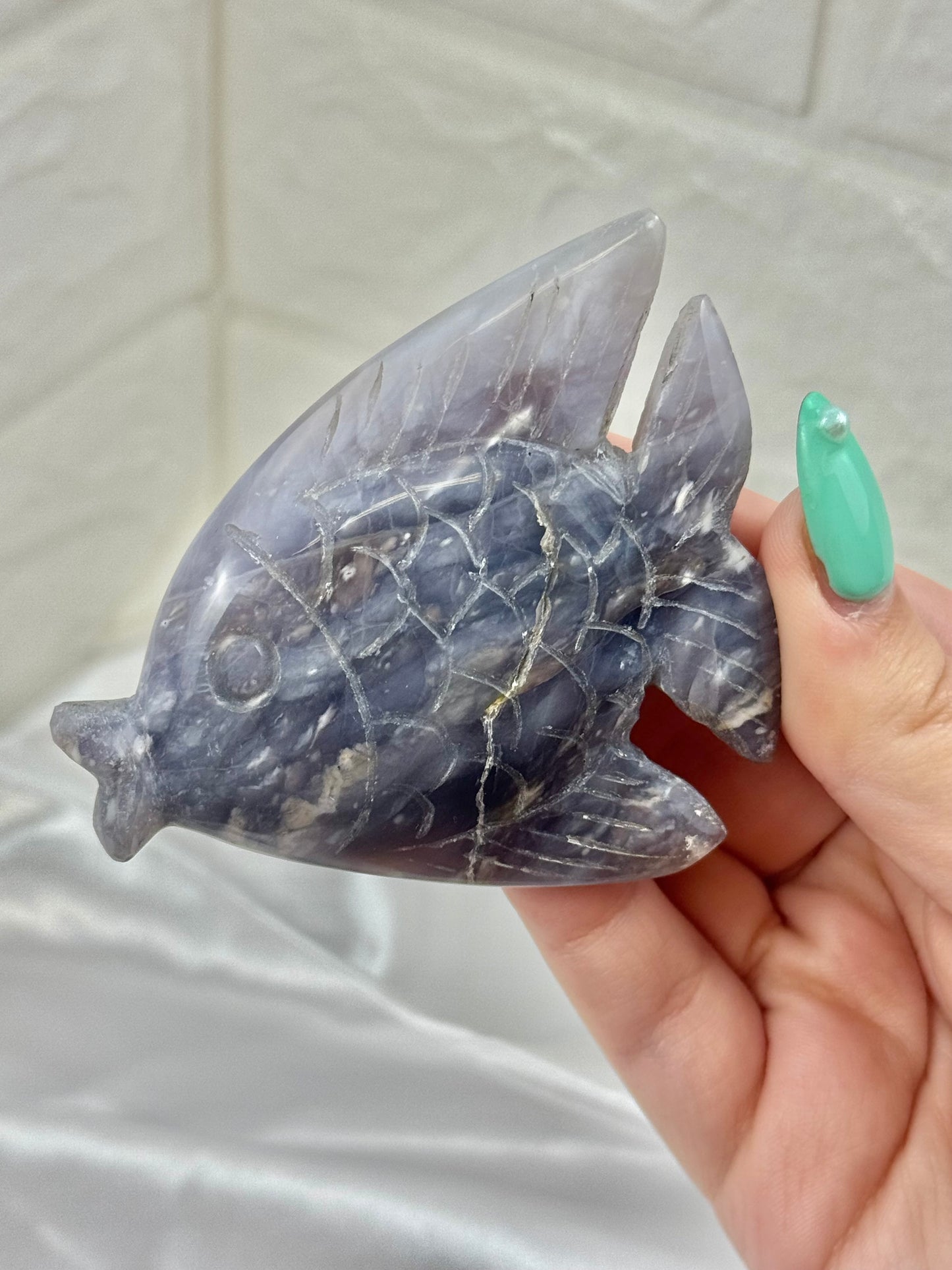 Adorable purple chalcedony fish