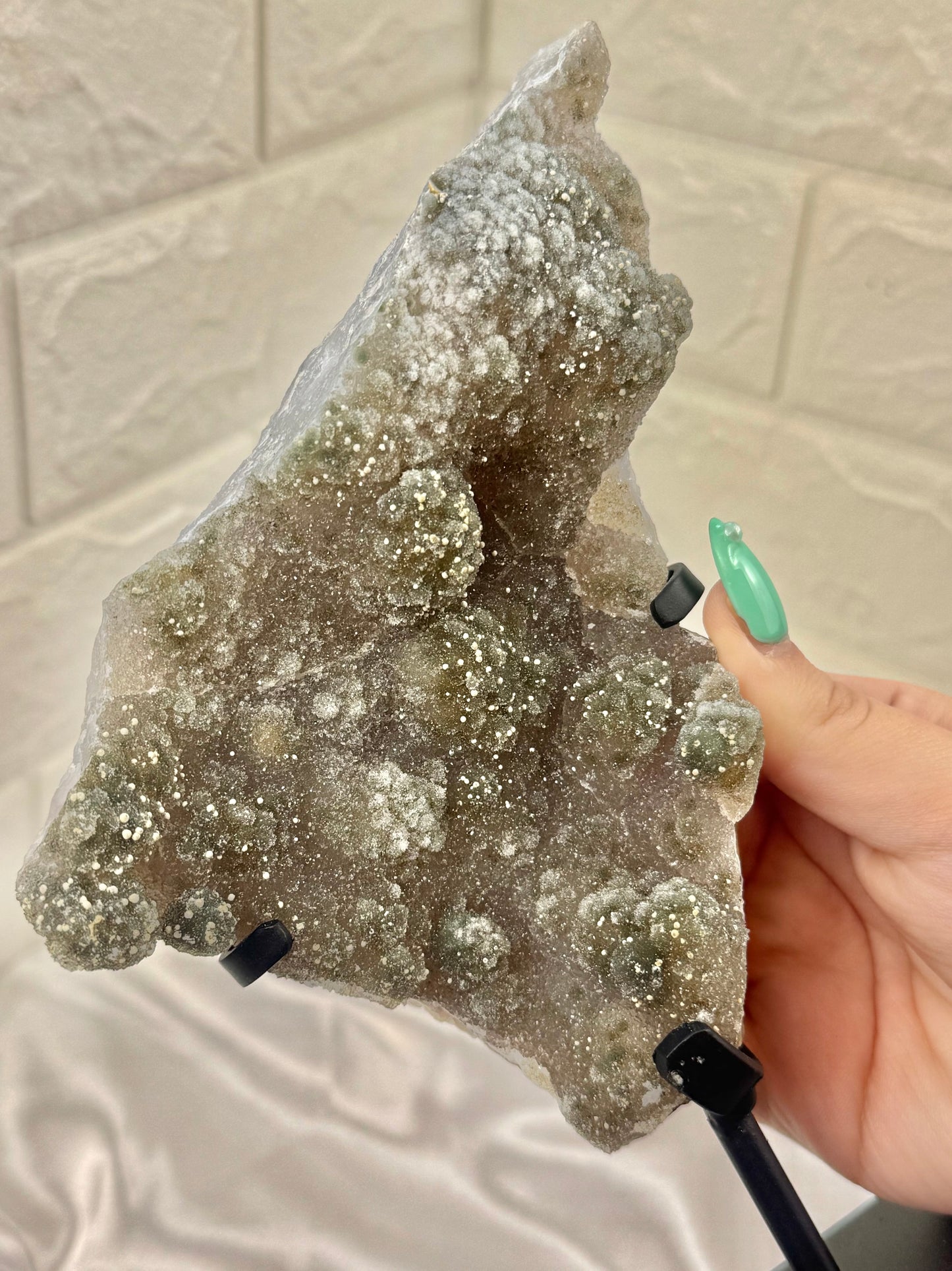 Stunning green amethyst crust on stand from Brazil