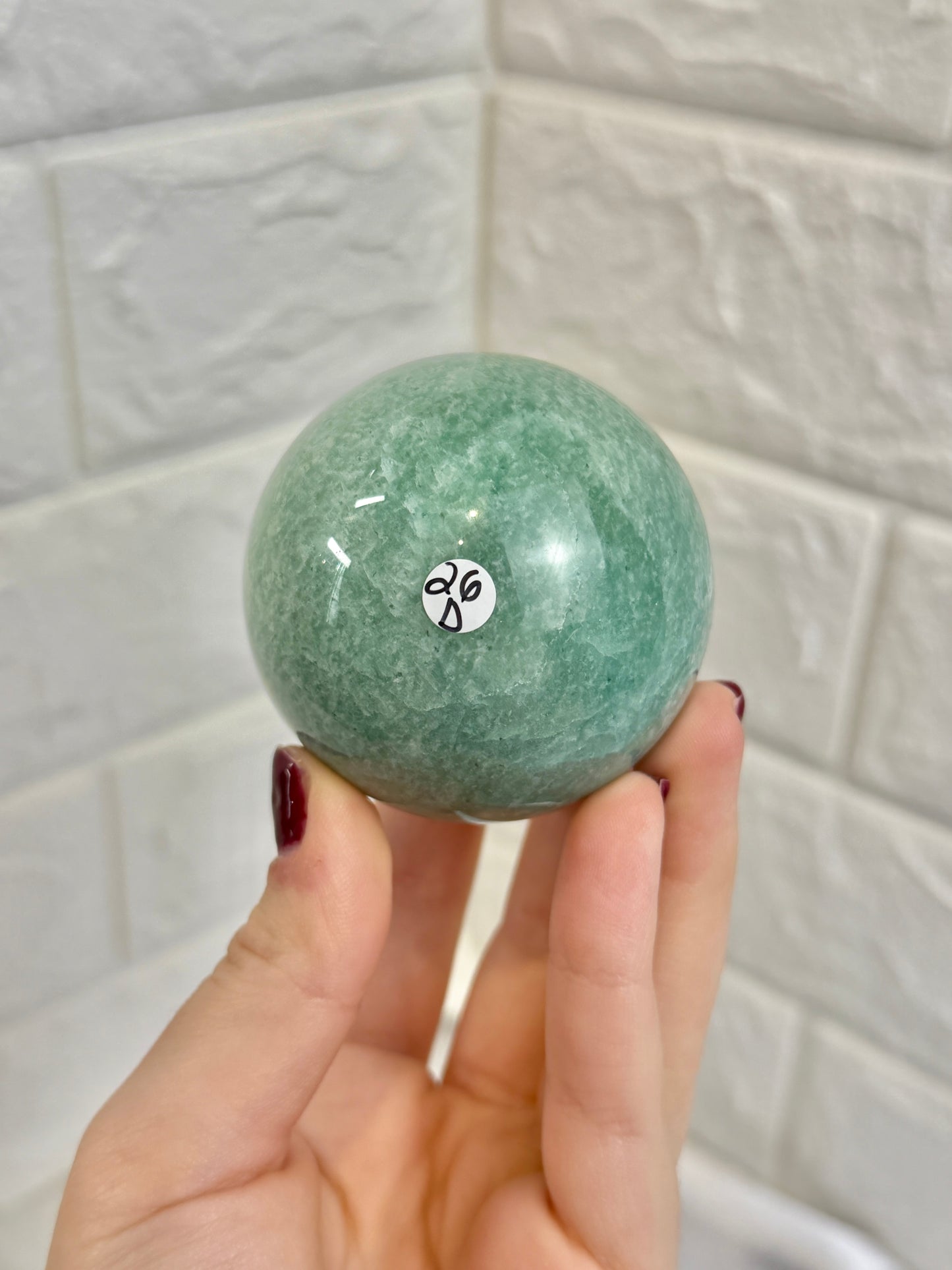 Flashy amazonite sphere