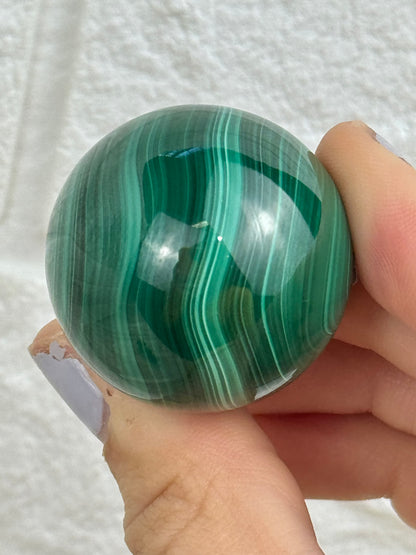 You pick! Chatoyant malachite spheres