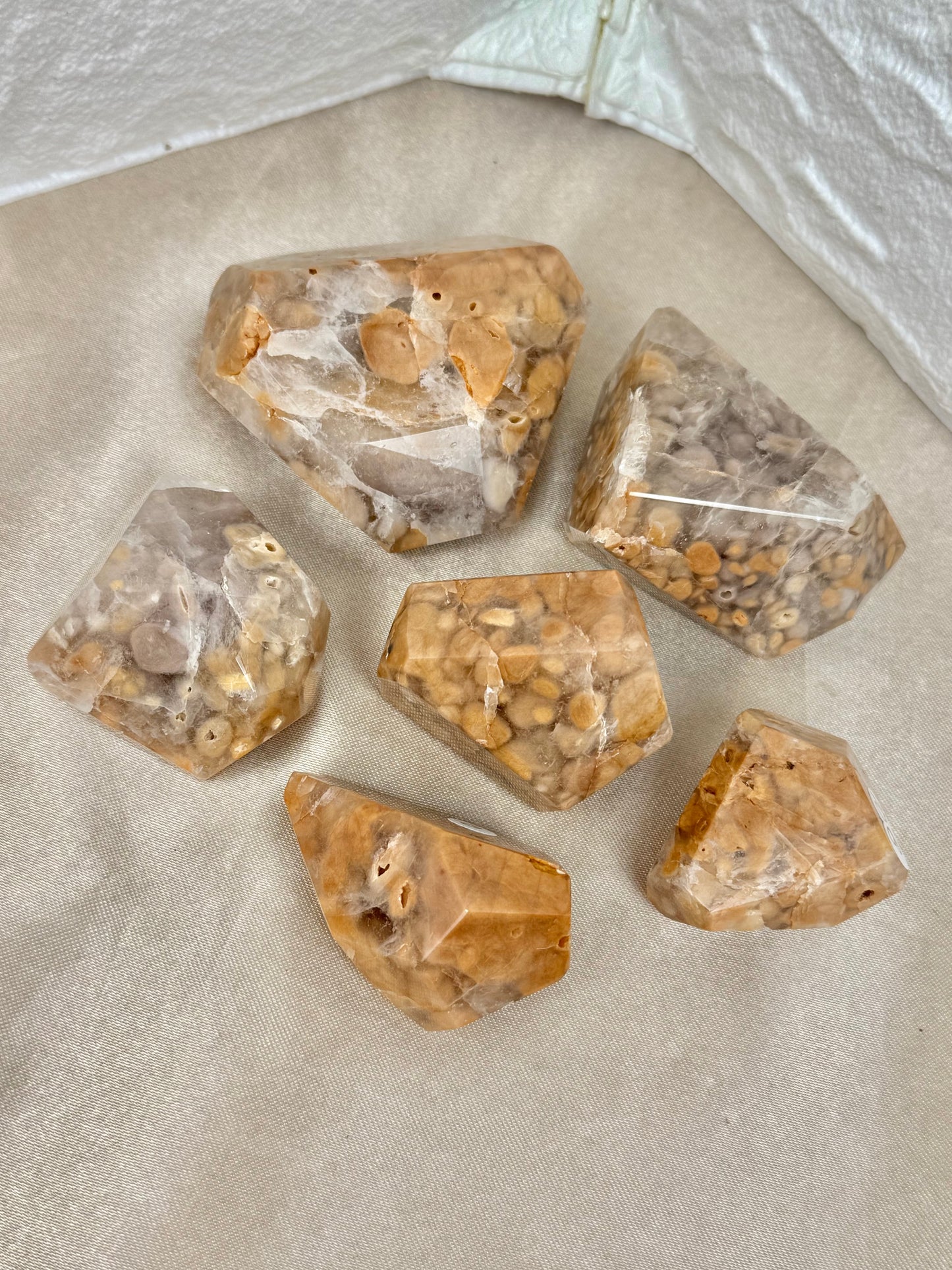 You pick! Unique orange amphibole in quartz from Brazil