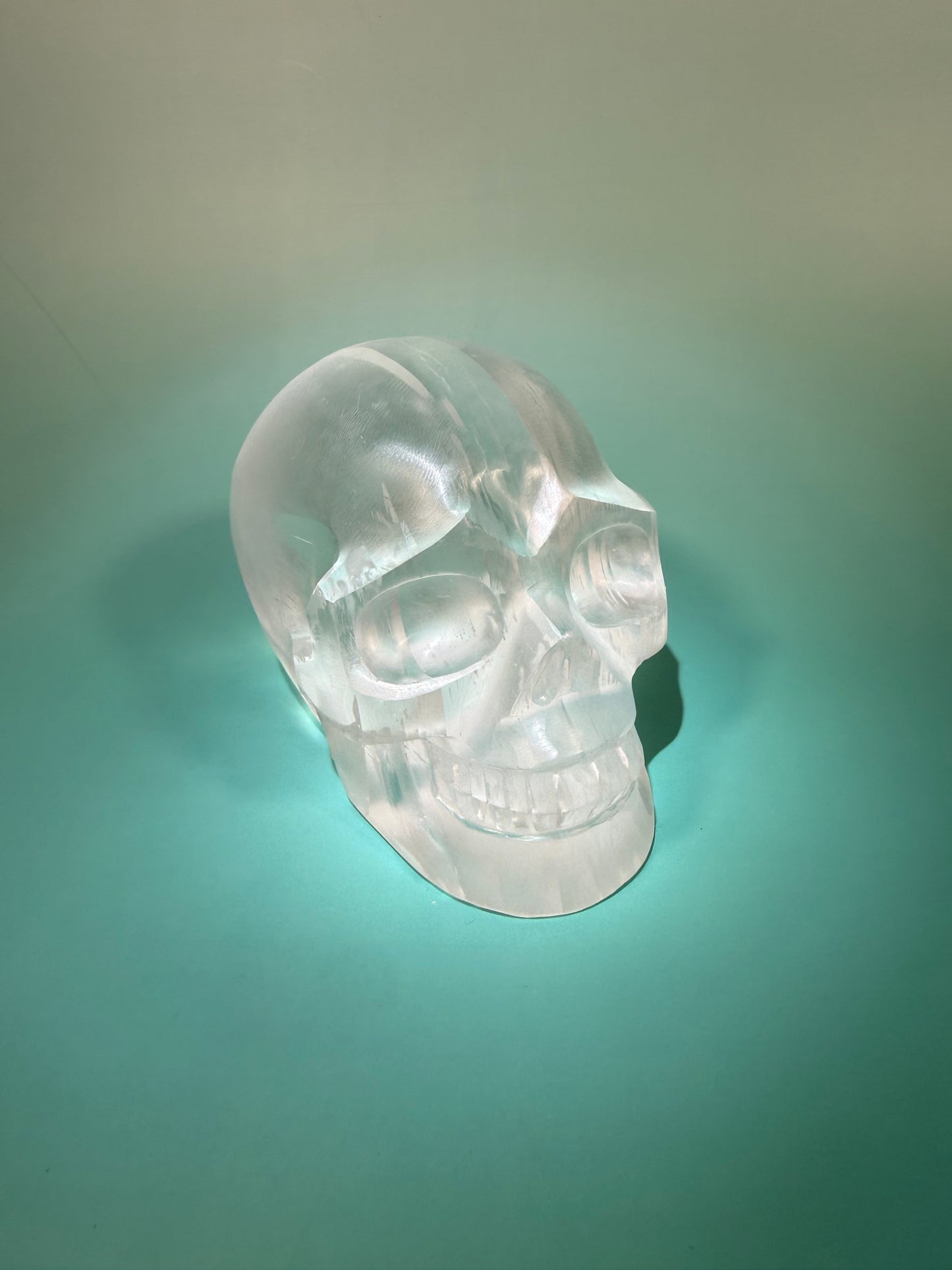 Incredible satin spar skull carving C