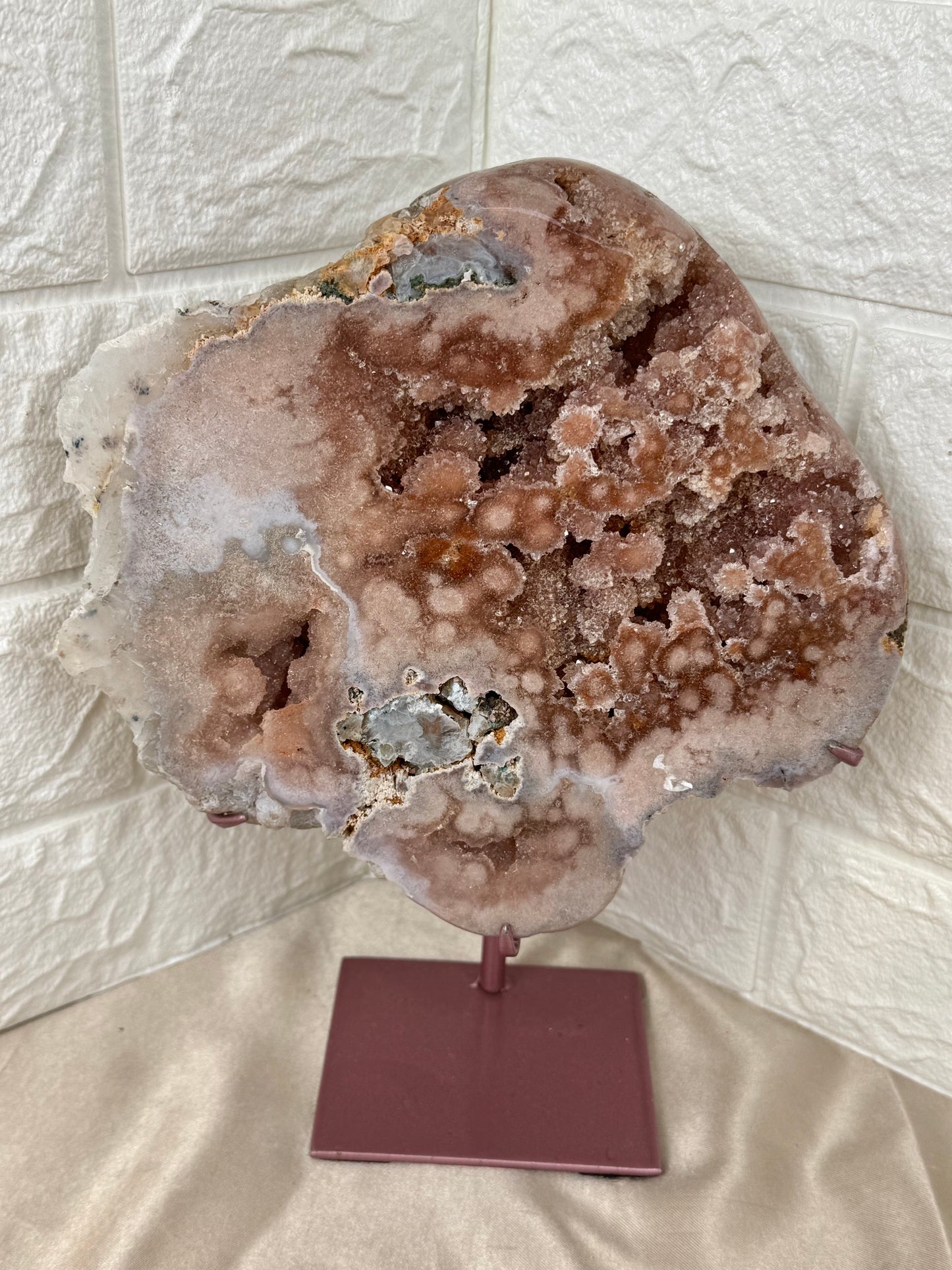 Druzy pink amethyst slab on rose gold stand from Brazil
