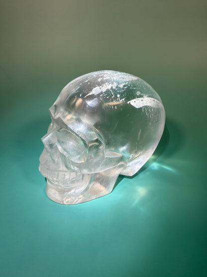 Beautiful satin spar skull carving Q