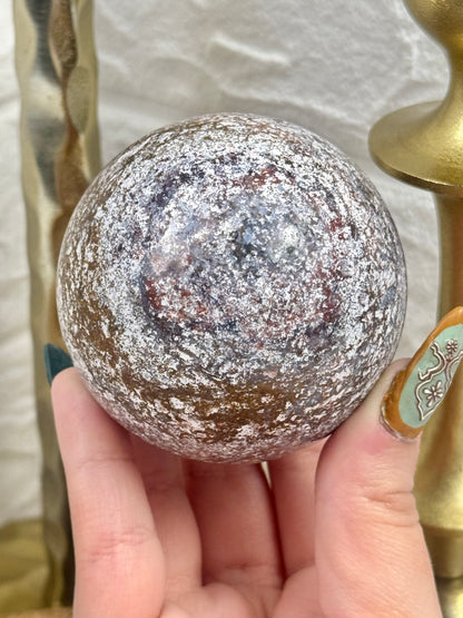 Purple/brown sea jasper sphere