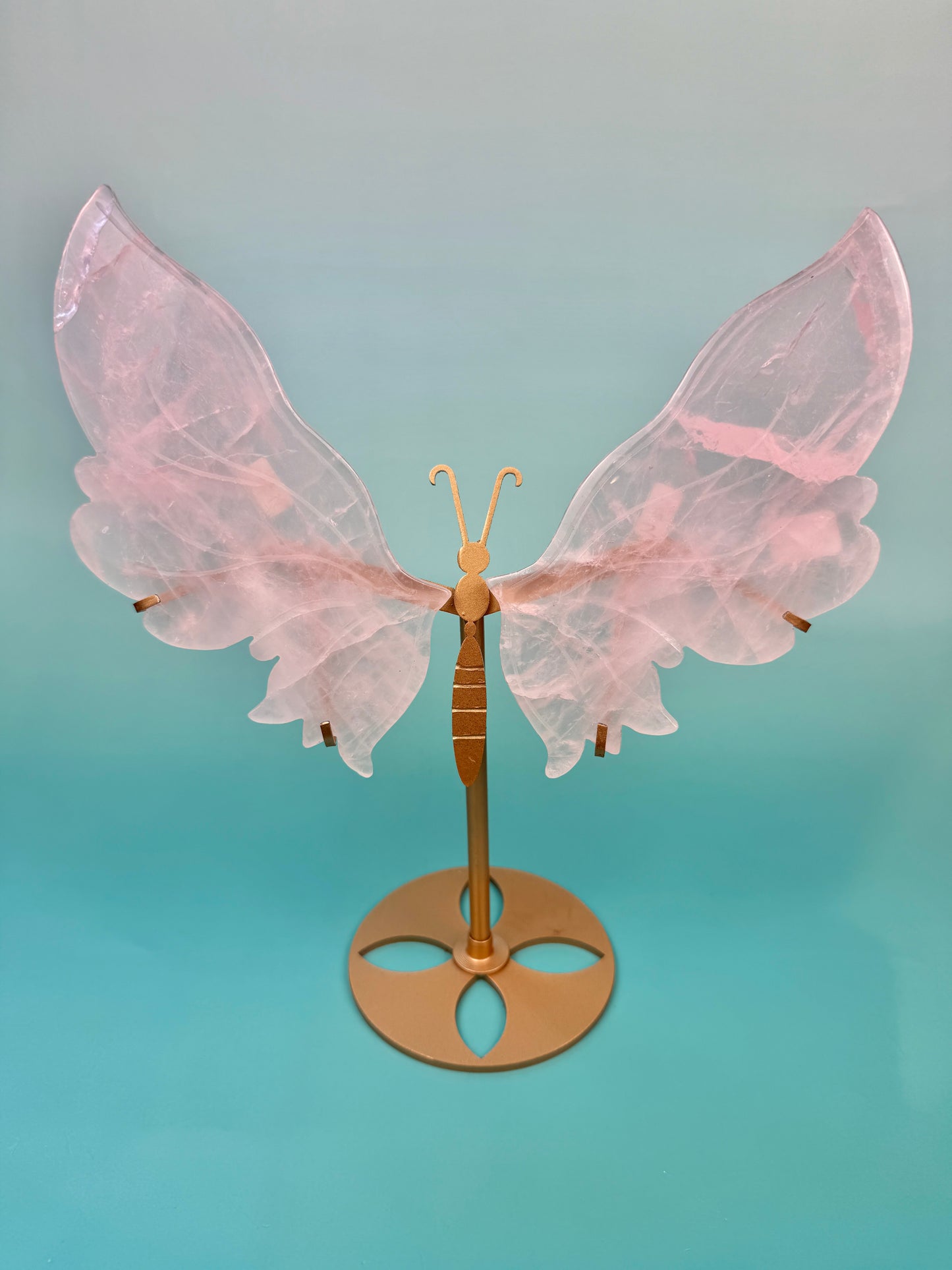 Beautiful rose quartz butterfly on gold stand
