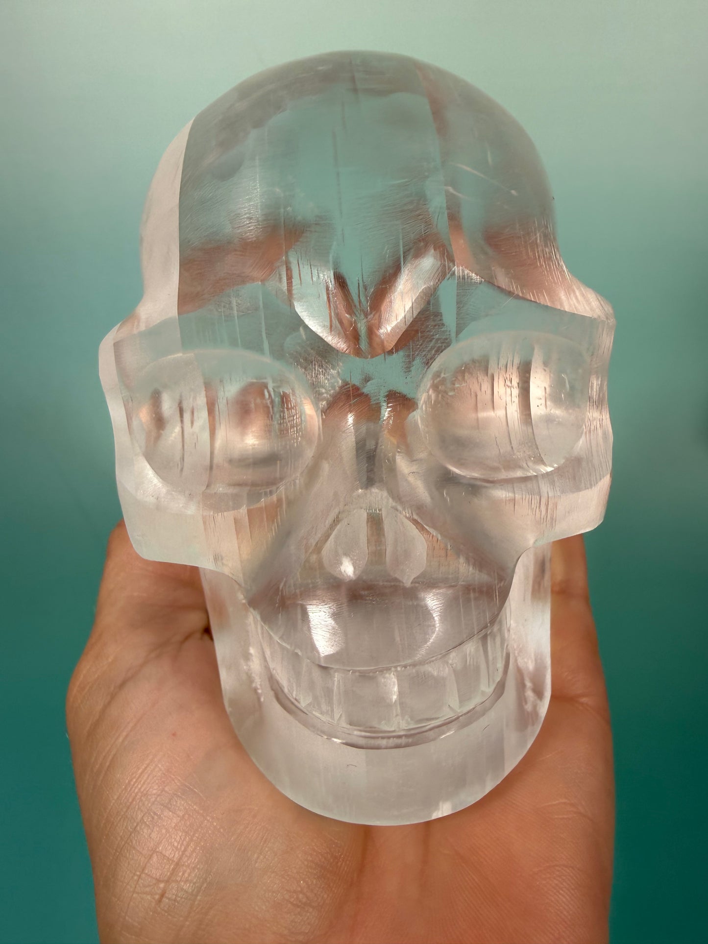 Stunning satin spar skull carving A